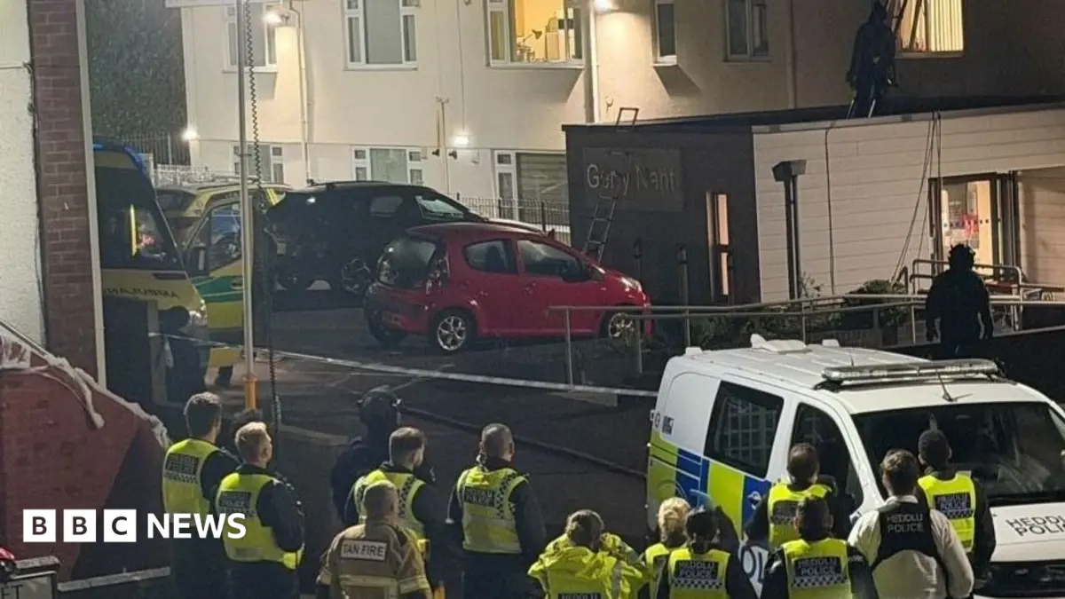 Armed Police Arrest 61-Year-Old Man for Murder After Woman Dies in Welsh Road Crash