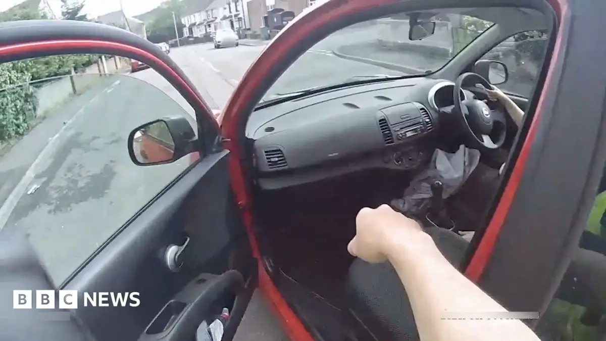 Woman Gives Police Officer Lift in Nissan Micra During Pursuit of Suspect
