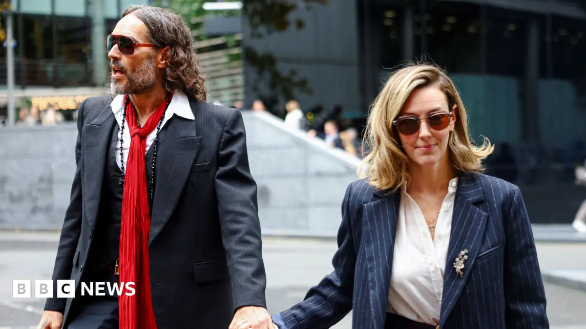 Russell Brand's Wife Laura Defends Him in Rape Trial, Citing His Kindness