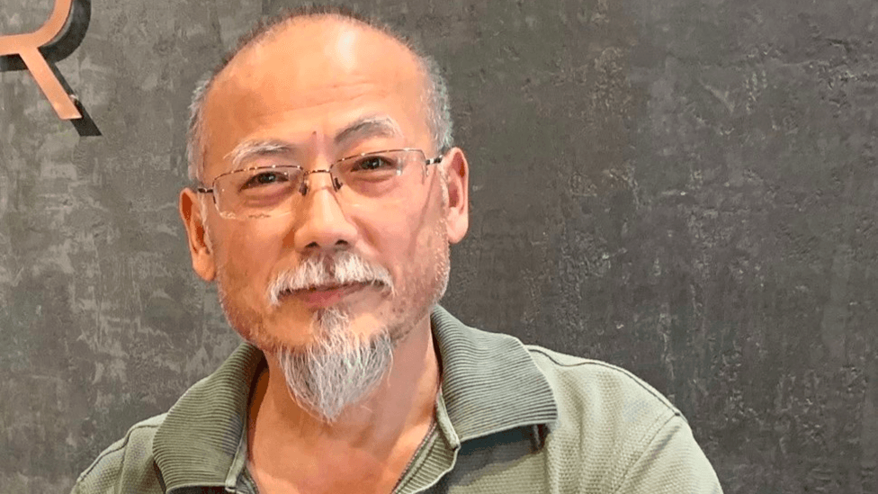 Chinese Dissident Dong Guangping Detained in South Korea After Sea Escape