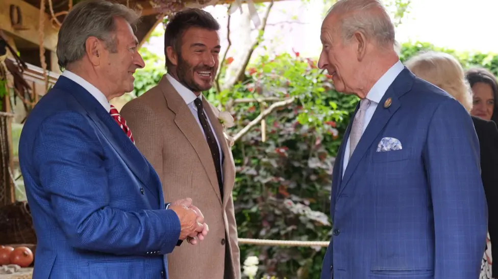King Charles III and David Beckham Meet at Chelsea Flower Show Amid Gnome Display